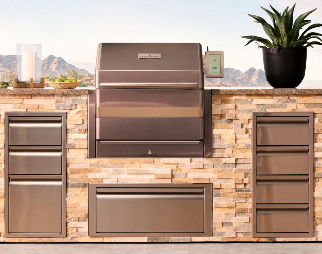A Memphis Wood Fire pellet grill built into an island