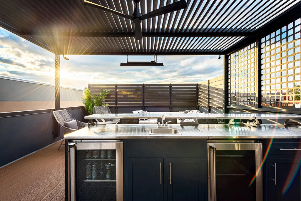 Weather-resistant outdoor kitchen enclosures and cabinetry